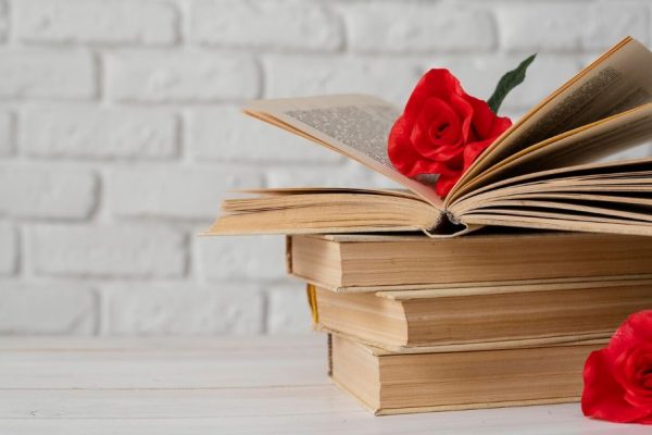 arrangement-with-books-flowers_23-21488827851