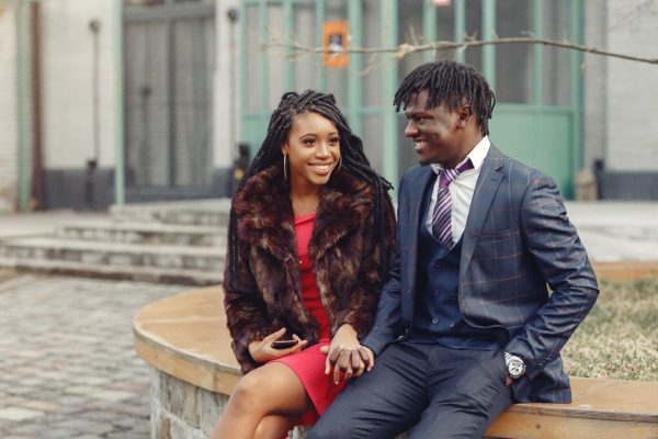 stylish-black-couple-spending-time-spring-city_1157-32325